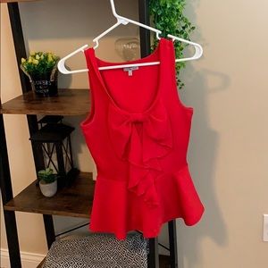 Red peplum tank top blouse with bow tie in front